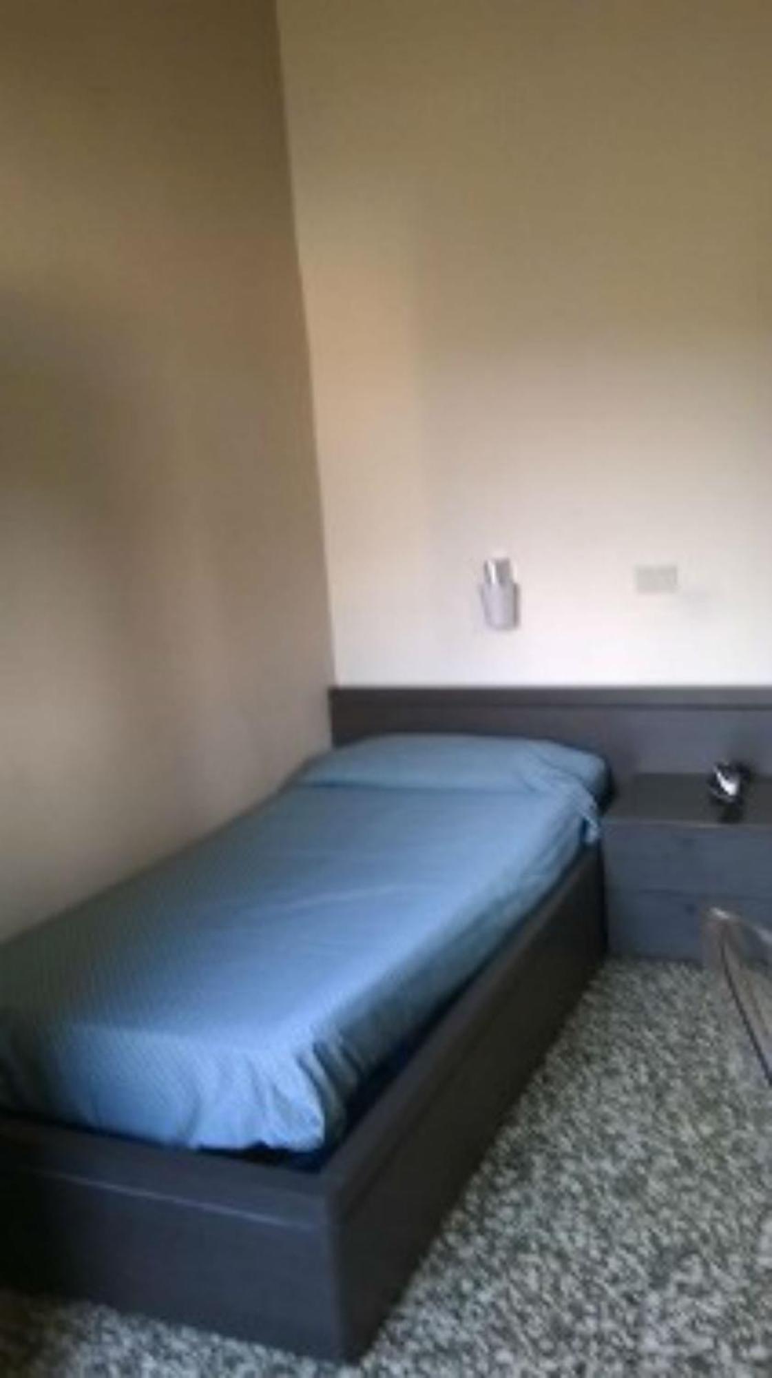 Hotel Moderno Pisa Szoba fotó